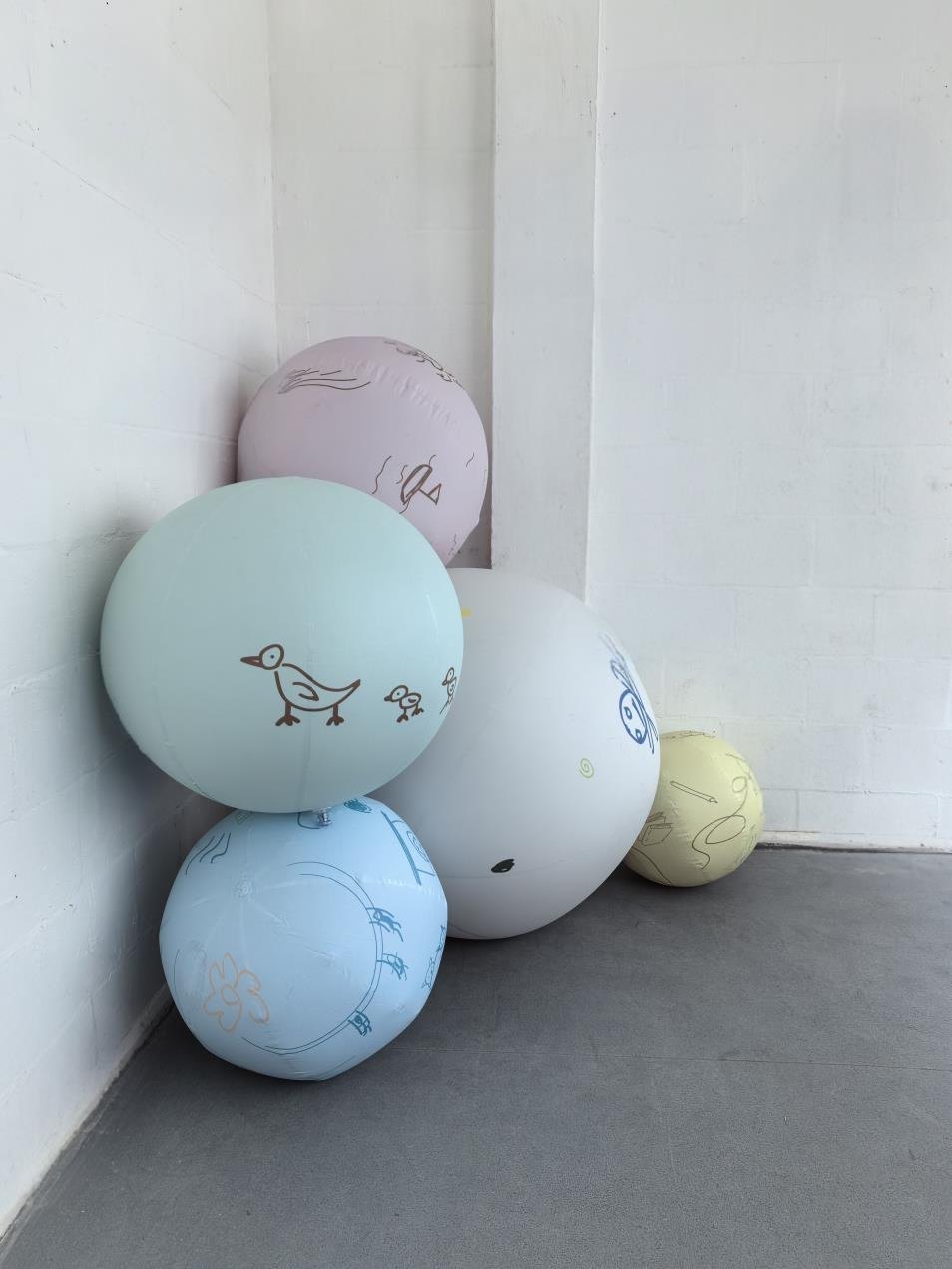 A group of inflated forms in the studio.